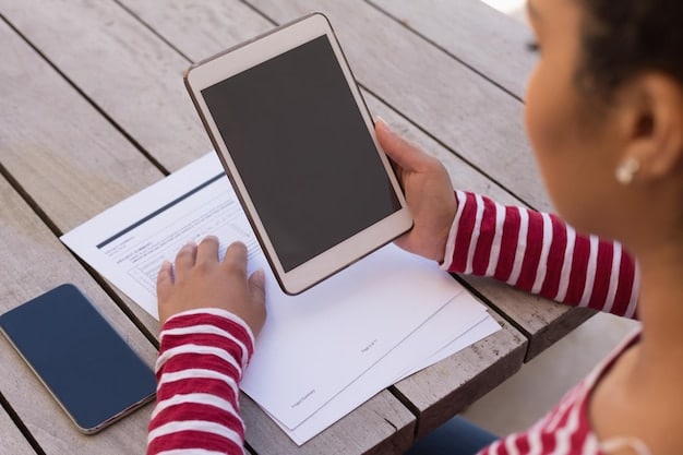 A close-up shot of a student using a digital textbook on a tablet in a classroom, with a teacher assisting in the background. The scene focuses on the interaction with the device and the learning process.